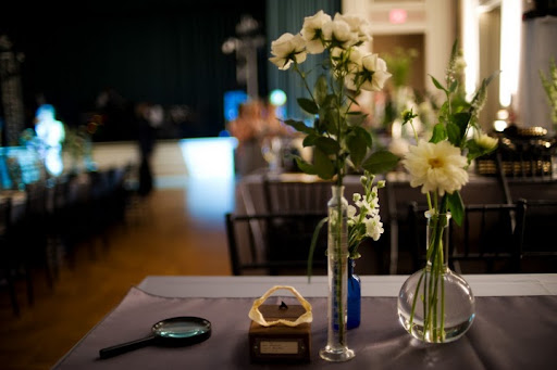 Some scientific glassware floral arrangements at the reception. Some scientific glassware floral arrangements at the reception.