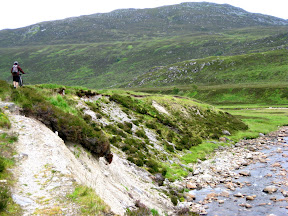 it's hard to tell from this photo how hard it was to bike this part of the trail.  sometimes you would put your foot down onto the seemingly solid reedy grasses to hear the water streaming under your foot.  we had no choice but to walk and push a few times.  we saw a few deep ruts from stuck mountain bikers from previous days which was reassuring to know that we were at least veering in the right direction.