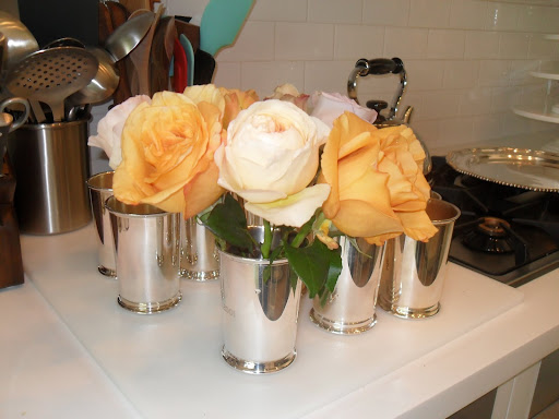 If you put your roses in a cylender vase, they would stand up straight and it wouldn't show off the roses' faces.