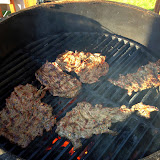 The carne hits the grill.