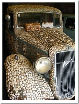 1937 Austin covered in 27000 shells.