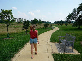 CM w/Gina approaching columns --- Another very cool thing at the Arboretum are the old National Capitol Columns. They used to be part of the East Portico, and now sit on this hill holding up the sky!