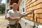National Fiber Technician Installing cellulose during training exercise.