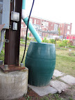 A rain water collection system is a green way to keep the plants well-watered.
