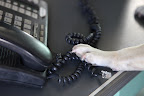 I'll just unplug the wire from the handset and allow it to uncoil.