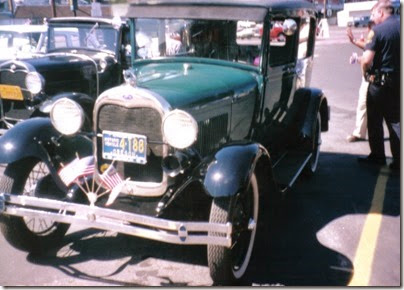 41 1929 Ford Model A Tudor Sedan in the Rainier Shopping Center parking lot for Rainier Days in the Park on July 13, 1996