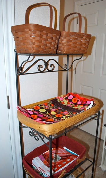 Longaberger wrought iron stand with fabric strips.jpg Longaberger wrought iron stand with fabric strips