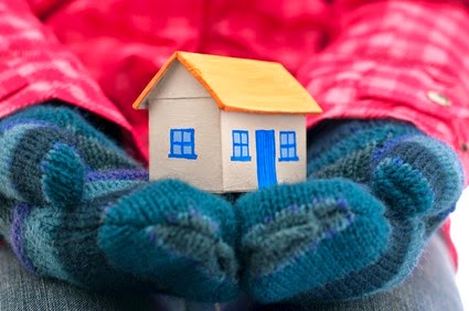 [Woman-in-Mittens-Holding-House%255B4%255D.jpg]