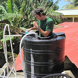 Cleaning out the tinaco (roof water tank)