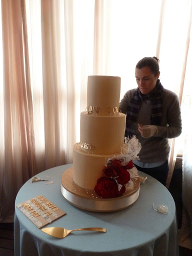Here, Lauren starts to set out the lyrics on the cake. It was important to get the spacing right before pushing them in. Here, Lauren starts to set out the lyrics on the cake. It was important to get the spacing right before pushing them in.