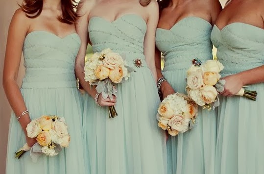 [bridesmaids-MiBelle-arrangements-flo.jpg]