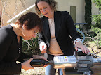 The second to last step is putting the foil top over the cork, using this machine.