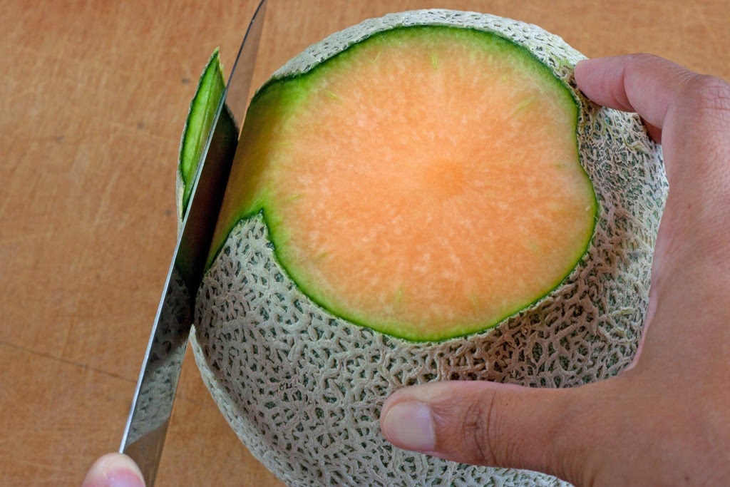[Slicing%2520the%2520skin%2520of%2520the%2520melon%2520in%2520thick%2520strips_edited-1%255B6%255D.jpg]