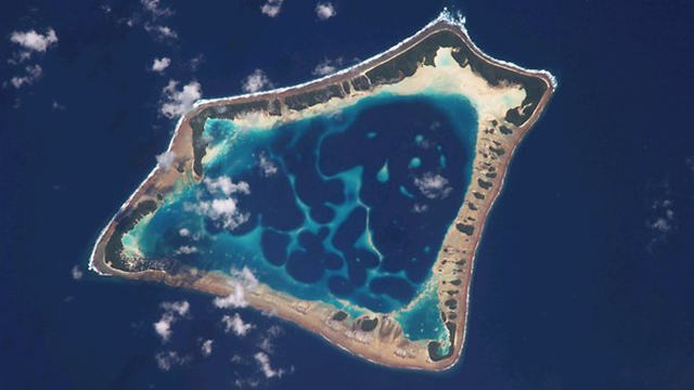 Water crisis: A NASA photo captures Atafu Atoll, the smallest of the Tokelau Islands in the Southern Pacific Ocean. Experts say there will be no drinking water left by the middle of October 2011. NASA