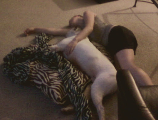 Not long after arriving at his adoptive home, Wilson naps spooned by the new mama he already adores!