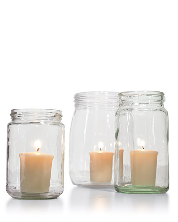 With a candle placed inside these glass jars, the lighting looks eclectic and interesting. They'd look fabulous on your outdoor bar or tablescape.
(marthastewart.com)