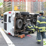 MVAWithOverturnedAutoAtCropseyAve27thStreetHillelEngel