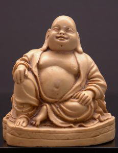 Laughing Budha: Chinese Ch'an (Zen) monk who lived over 1,000 years ago and has become a significant part of Buddhist and Shinto culture