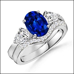 Oval Sapphire and Diamond Three Stone Ring Oval Sapphire and Diamond Three Stone Ring