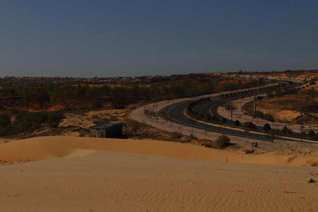 Mui Ne Highway next to the white sand dunes Mui Ne Highway next to the white sand dunes