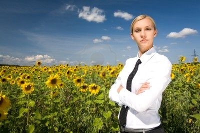 [8494134-portrait-of-serious-business-lady-with-folded-arms-in-sunflower-field%255B5%255D.jpg]