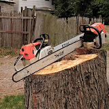 A pair of big Stihl 084's ~ my stump cutter and tree feller
Thats a 41" bar and 30" bar ~ with 404 .063 heavy chains