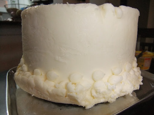 With a little freezer burn and the piping a mess, we nervously started to dig into our cake.