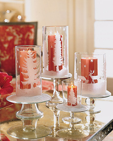 These glittered candleholders are elevated on glass cake stands, then dusted with faux snow. These glittered candleholders are elevated on glass cake stands, then dusted with faux snow.