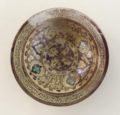 Bowl | Origin:  Syria | Period: 12th-13th century  Ayyubid period | Details:  Not Available | Type: Stone-paste painted under clear-glaze | Size: H: 7.5  W: 25.9  cm | Museum Code: F1942.5 | Photograph and description taken from Freer and the Sackler (Smithsonian) Museums.