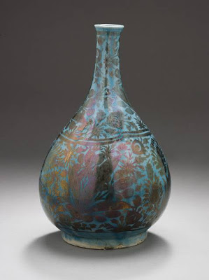 Wine Bottle Iran Wine Bottle, second half of the 17th century Ceramic; Vessel, Fritware, overglaze luster-painted, 8 7/16 x 5 1/16 in. (21.4 x 12.9 cm) The Nasli M. Heeramaneck Collection, gift of Joan Palevsky (M.73.5.196) Art of the Middle East: Islamic Department.