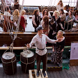 The enthusiastic cast of actors from Hope Street Ltd, directed by Paula Simms, re-enact scenes from the period of the Great Potato Famine of 1845-1862 which lead to mass migration from Ireland to all corners of the world. Liverpool played a huge part in this by being the gateway into the mainland and also the embarkation port for those on their way to the other continents. The company of actors put on performances, on the hour, on board the sailing ship Zebu and the quayside, depicting the different aspects the migrants had to endure. The crowd shared in their emotions of horror, fright, hope and joy as the journey progressed through out the day. A most fantastic production, and with such a fabulous backdrop of the Dock! LIF'11-2 Comings & Goings at Albert Dock WEB