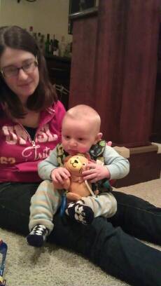 Charlie loves his world music lion from Claudia and Rick