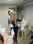 Producer Barbara Fight looks like she really loves Clive and it looks like he's digging it, too.