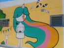 Mural Niña y Conejo en Plaza Pistoleta
