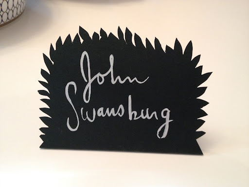 Place cards meant to look like funny little bushes on the tables. This was a labor intensive last-minute preparation that I found myself doing in our hotel room at 6 a.m. the day of the wedding, and finished maybe an hour before the ceremony. I couldn't delegate the cutting since it was my own hair-brained thing, but I should have delegated the lettering. All handwriting, even terrible handwriting, is charming.