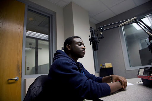 Michel Chikwanine , a former child soldier, tells KSMU's Jennifer Moore his life story. Photo Credit: Alex Crowder