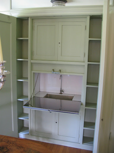 The murphy bed of liquor cabinets.