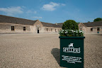 A very pristine looking stables, bathed in sunshine