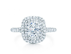 Perfect for the girl desiring a big look, the hallmark of the Tiffany Soleste is the double row of bead-set diamonds encircling a cushion modified brilliant cut center stone. Perfect for the girl desiring a big look, the hallmark of the Tiffany Soleste is the double row of bead-set diamonds encircling a cushion modified brilliant cut center stone.