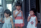 Eating ice cream -- little Iris, Nancy, and cousin Pei-Shan Eating ice cream -- little Iris, Nancy, and cousin Pei-Shan