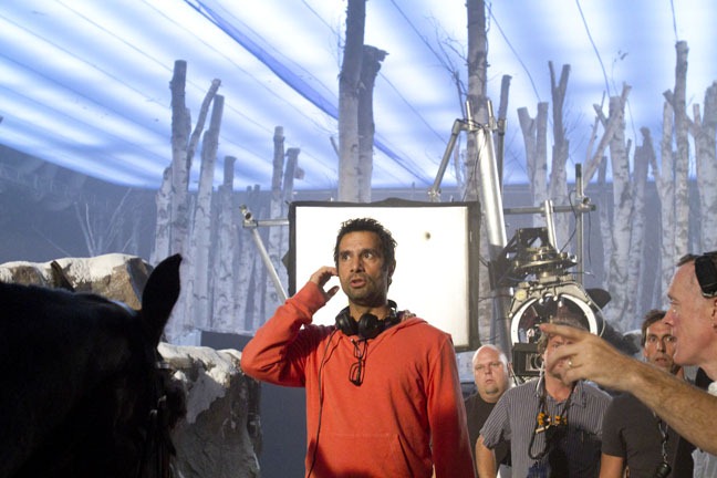 Director Tarsem Singh in a thoughtful moment on set, "Snow White," September 12, 2011