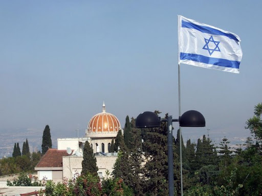 ADSCF4750 The Bahai Shrine and Israeli flag  in the foreground.jpg