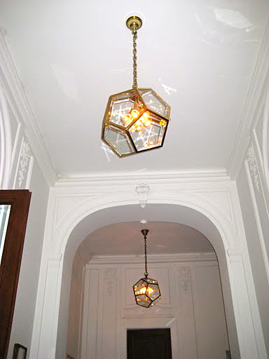 These light fixtures hang all around the gallery. They are so modern and elegant.
