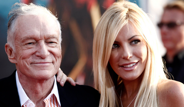 Hugh Hefner with the bullet he dodged, aka Crystal Harris