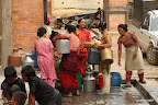 Women distributing water