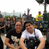 Waiting by the sidewalk for the Disney characters on parade