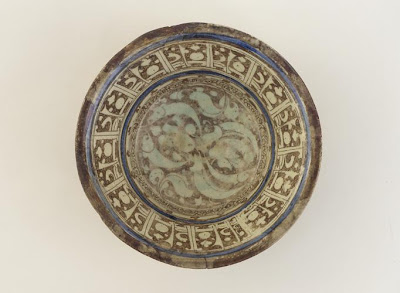 Bowl | Origin:  Syria | Period: 12th-13th century  Ayyubid period | Details:  Not Available | Type: Stone-paste decorated under glaze with blue and over glaze with brown lustre | Size: H: 10.5  W: 28.0  cm | Museum Code: F1908.148 | Photograph and description taken from Freer and the Sackler (Smithsonian) Museums.