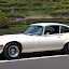 Jaguar,XK-E V12 1971 Coupe with Wahlsinn Headlight Covers Jaguar XK-E, with Head-Light-Cover Kit. The Head-Lamp-Cover Conversion Kit made by designer Stefan Wahl in the tradition of Malcolm Sayer. / Jaguar E-Type mit Scheinwerferabdeckungen, designed und hergestellt von Designer Stefan Wahl in der Tradition von Malcolm Sayer.