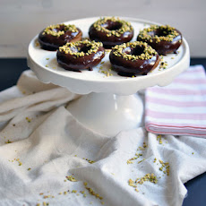 Baked Pumpkin Donuts with Chocolate Glaze and Chopped Pistachios