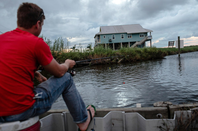 An elevated house for sale south of New Orleans in Plaquemines Parish, La. Buyers of properties in flood-prone areas could face steep increases in flood insurance premiums. Photo: William Widmer / The New York Times